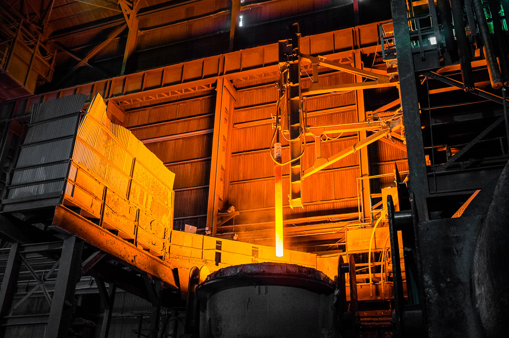 The stir lances can inject either argon to stir the molten steel, or oxygen which reacts with aluminum added to the bath to create a temperature rise if the molten steel gets too cold to cast.  The bath is around 3000 degress fahrenheit which is why the lance that has just been removed is glowing.

Some industrial shots from a steel mill that I am quite amazed at because they are jpgs and not from RAW.  I could have gotten more out of them from RAW captures -- but this is more than I expect from a JPG.  The shots have been tweaked in Lightroom.

Fujifilm X100.

Please like my Facebook Artists page: <a href=