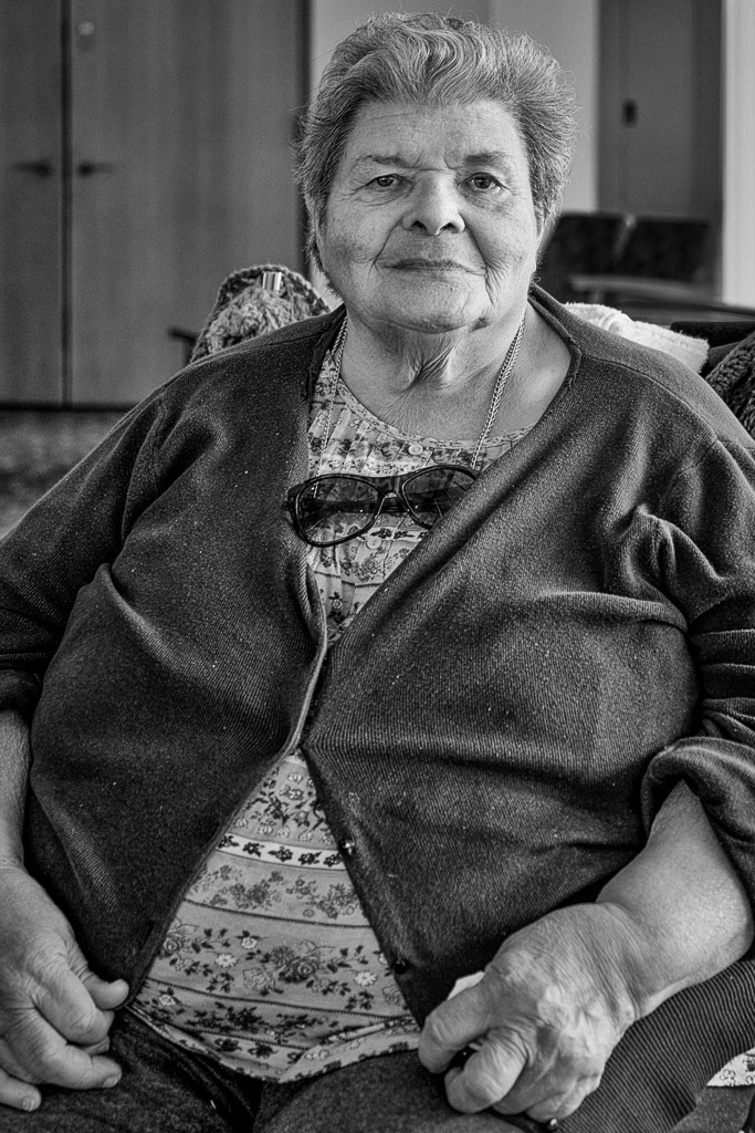 Ruth had a son who took off and she didn't hear from him for years.  Finally, after much prayer, he has returned and been in contact with his mother again.  Even when she had no news of him for years, she never gave up on him.

Ruth is in a nursing home with severe and crippling arthritis -- particular in her kness and she is in a wheelchair these days.

If you're a praying person, pray for Ruth and her son Mark as Mark struggles to rebuild his life, and Ruth holds on to hers.

Ruth voluntarily sat for this portrait and gave me permission to tell her story.  I see Ruth at a nursing home where I am a voluntary chaplain.